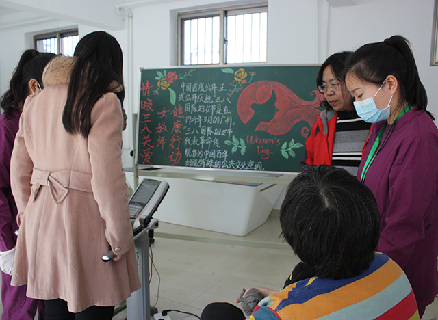 劲松职业高中双龙支部开展“暖心行动传真情，幸福家园共筑建”系列活动之一—— “情暖三八，关爱女教师健康行动”