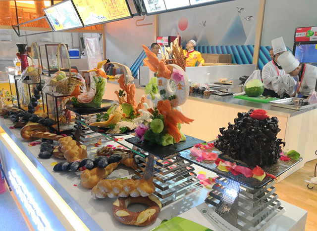 北京市劲松职业高中旅游服务专业集群完成亚洲美食节展示活动