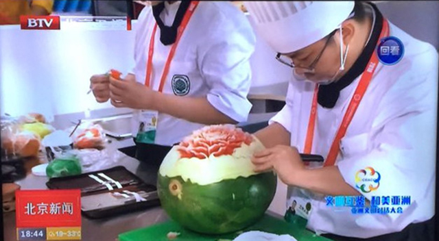 北京市劲松职业高中旅游服务专业集群完成亚洲美食节展示活动