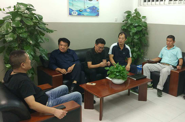 劲松职高总务负责人到工大附中参观考察